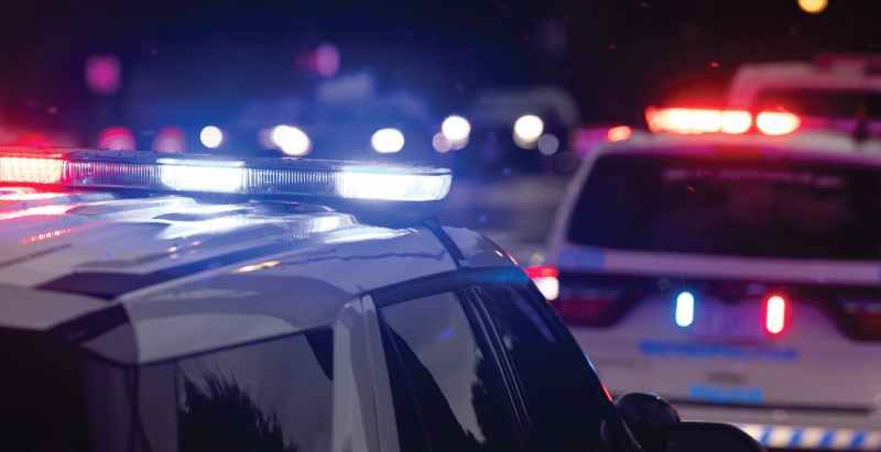 Police Patrol Car Lights At Night