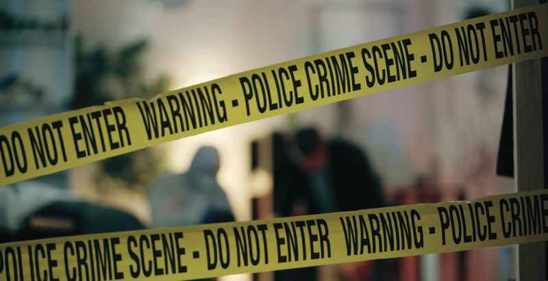 Police Yellow Tape At Apartment