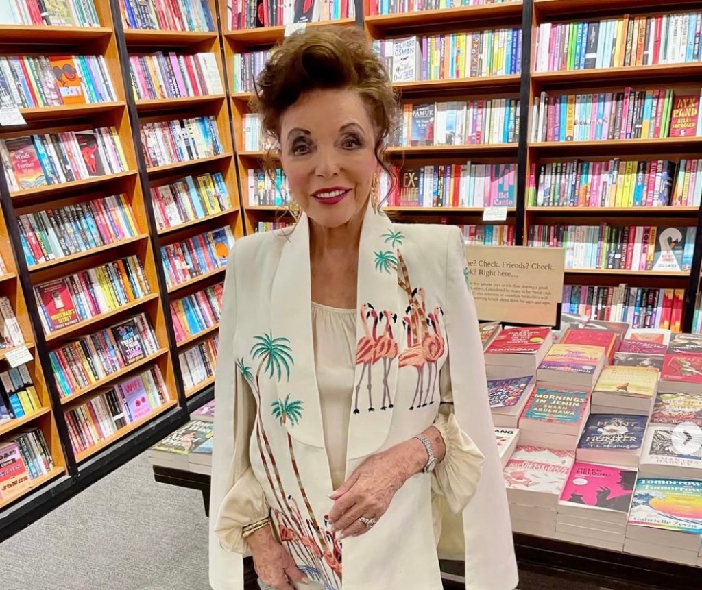 joan-collins-92-stuns-poolside-in-bold-swimwear.