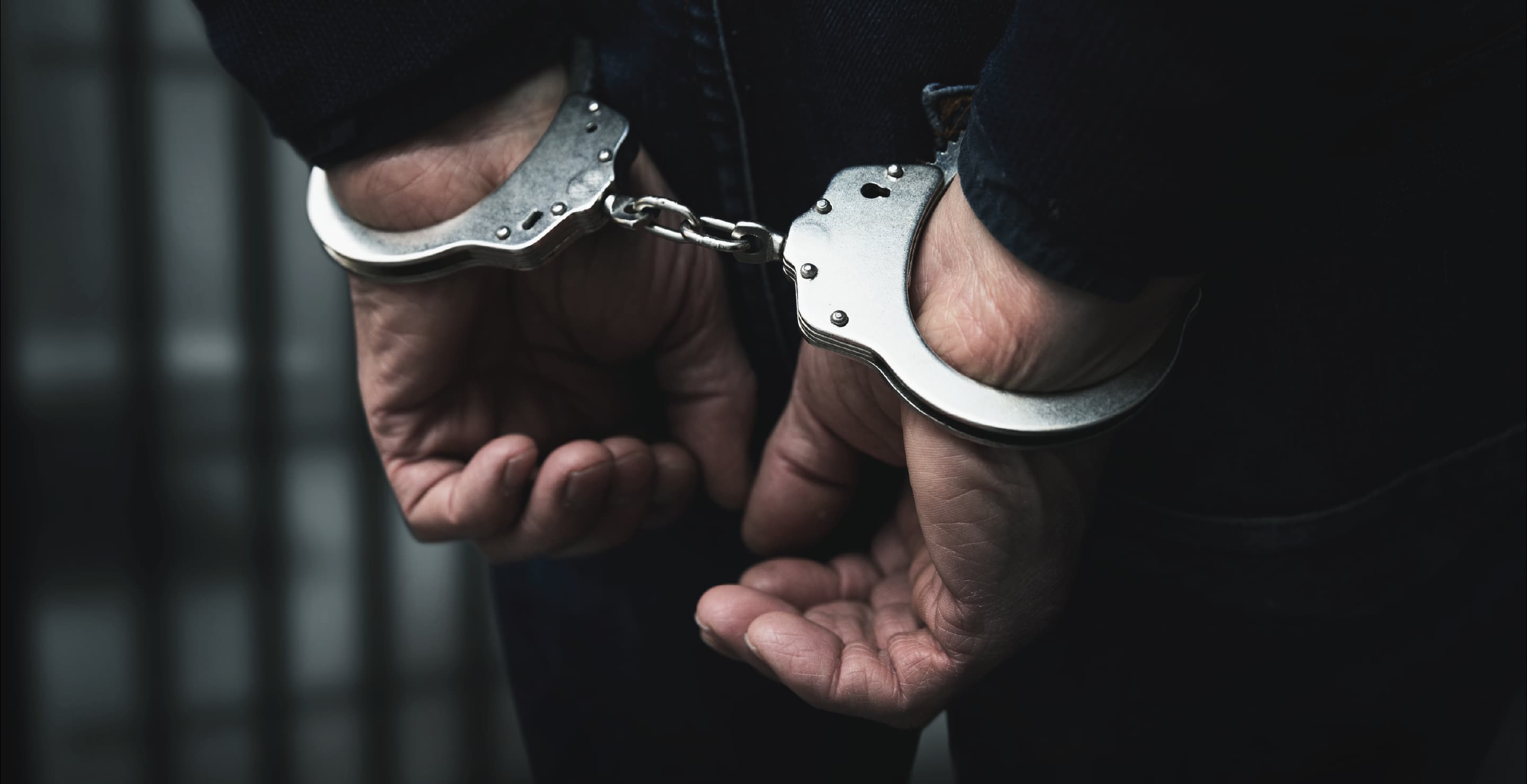 Arrested Man With Handcuffs