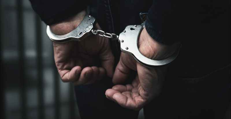 Arrested Man With Handcuffs