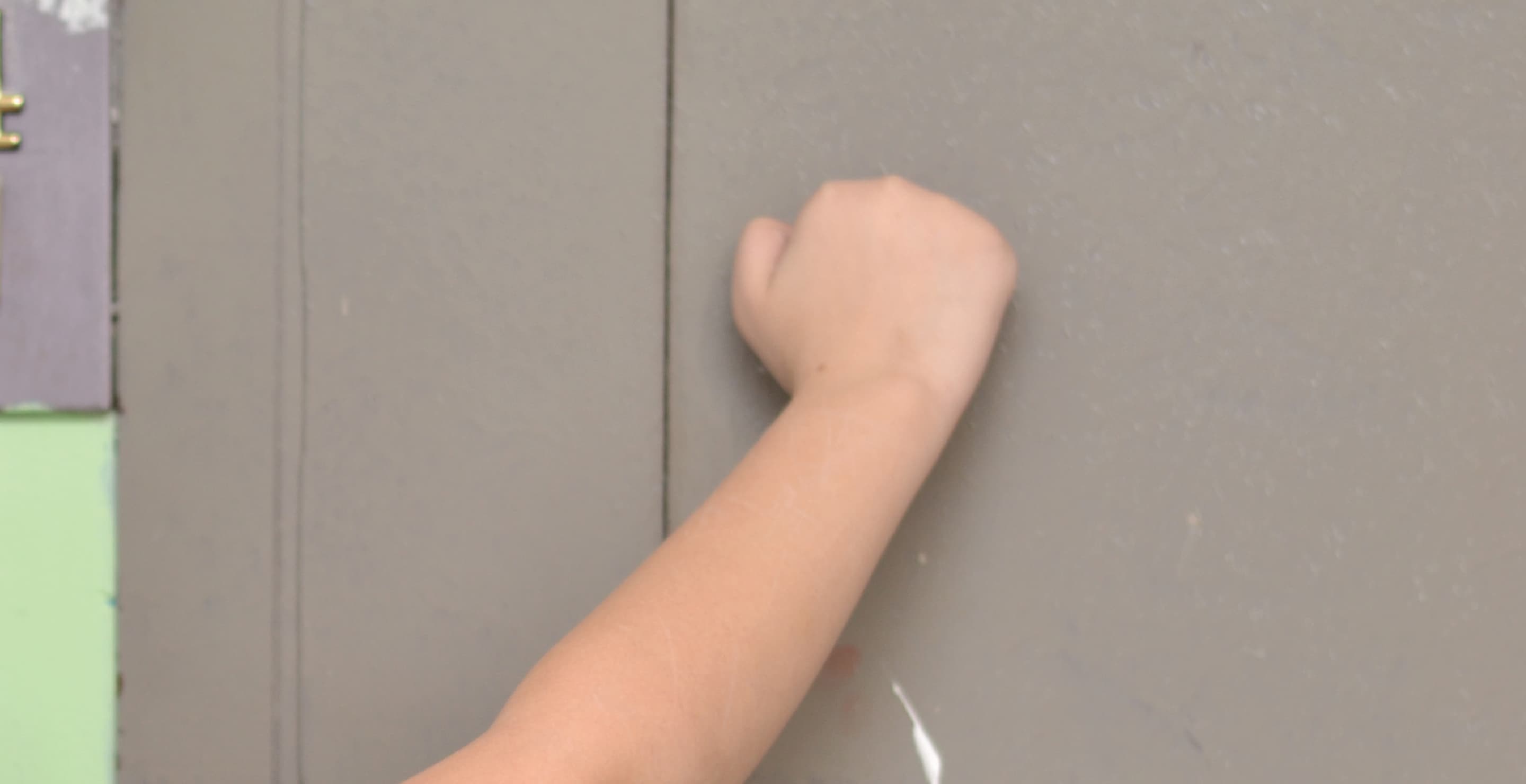 Boy Knocking On Door