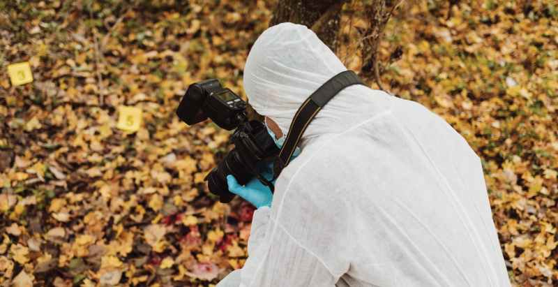 Forensic Personnel At Scene