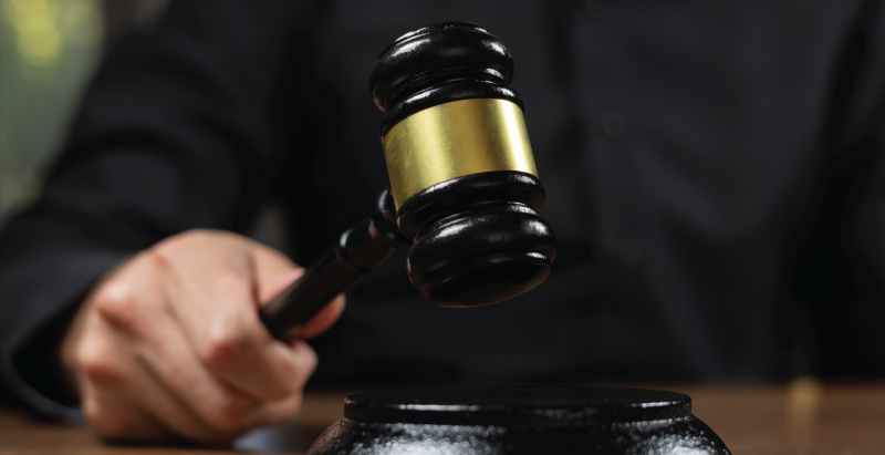 Judge With Gavel In Hand