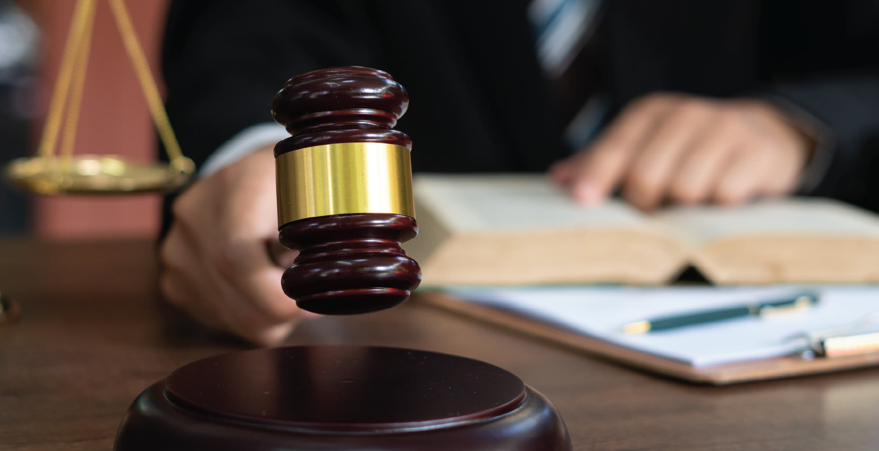 Judge With Gavel On Table