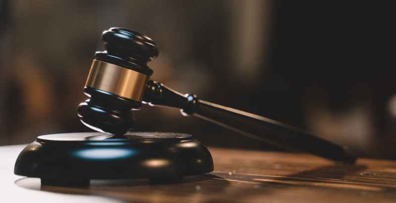 Judge Wooden Gavel In Courtroom