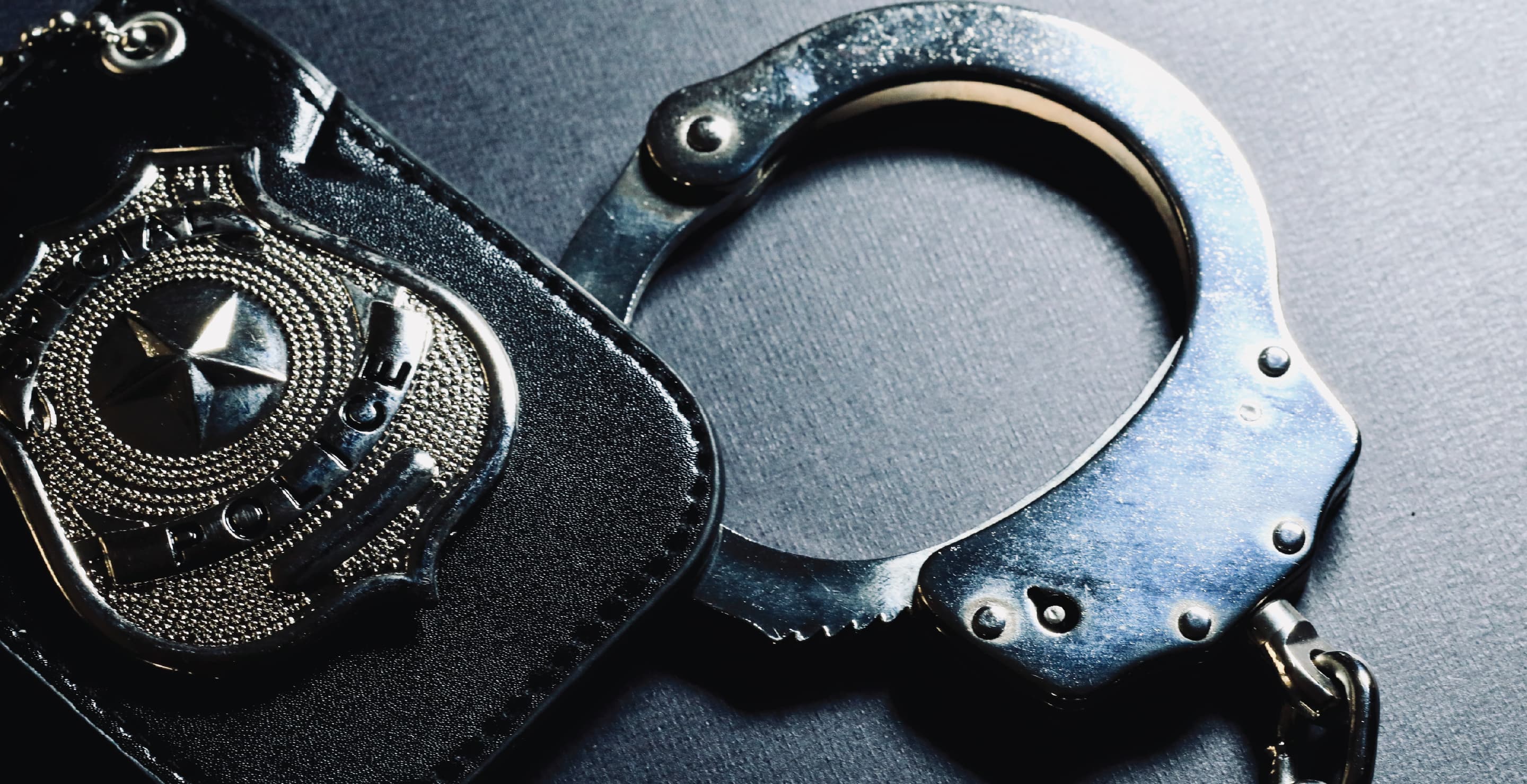 Police Badge And Handcuffs