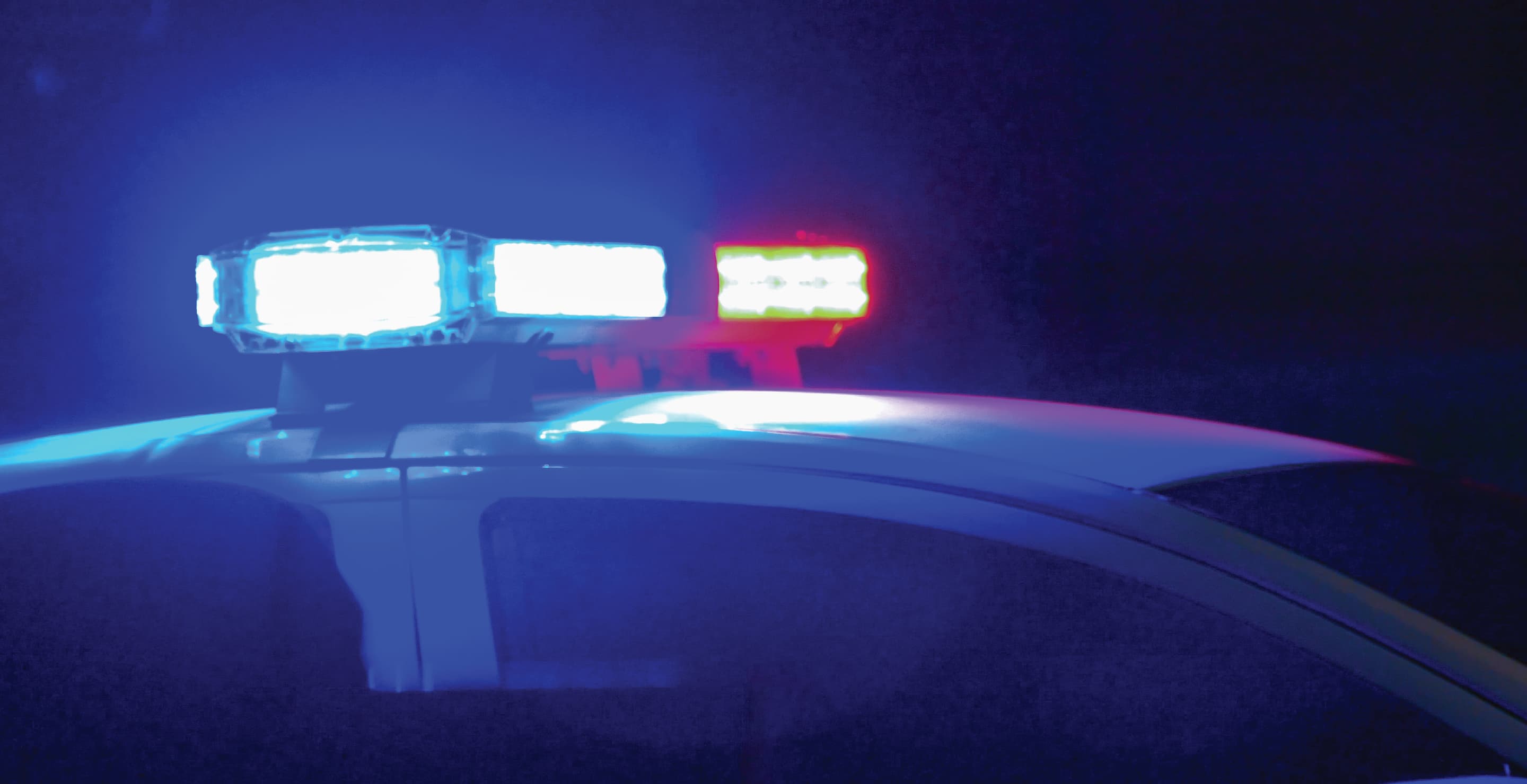 Police Car Flashing Blue And Red Lights