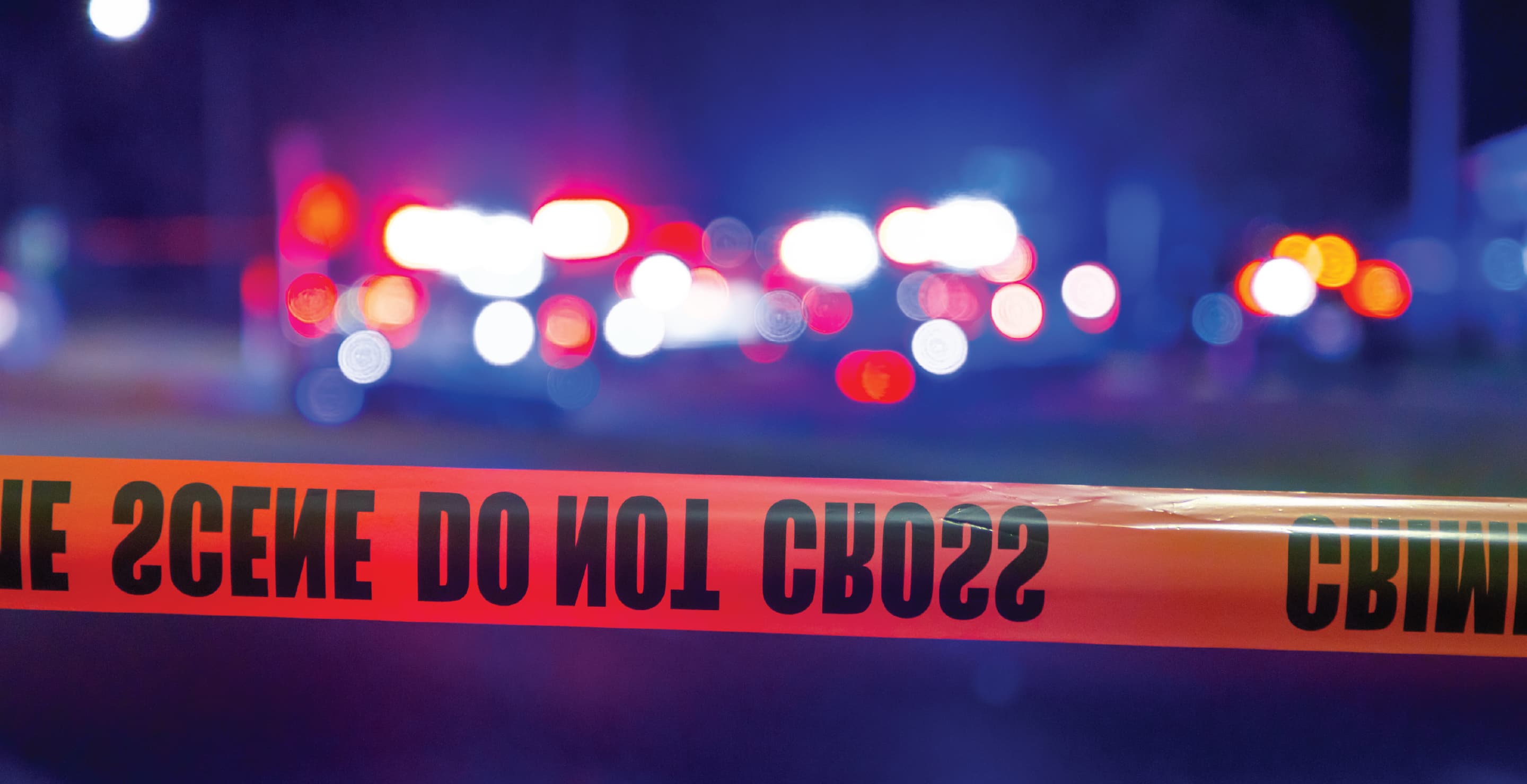 Police Car Flashing Lights At Crime Scene