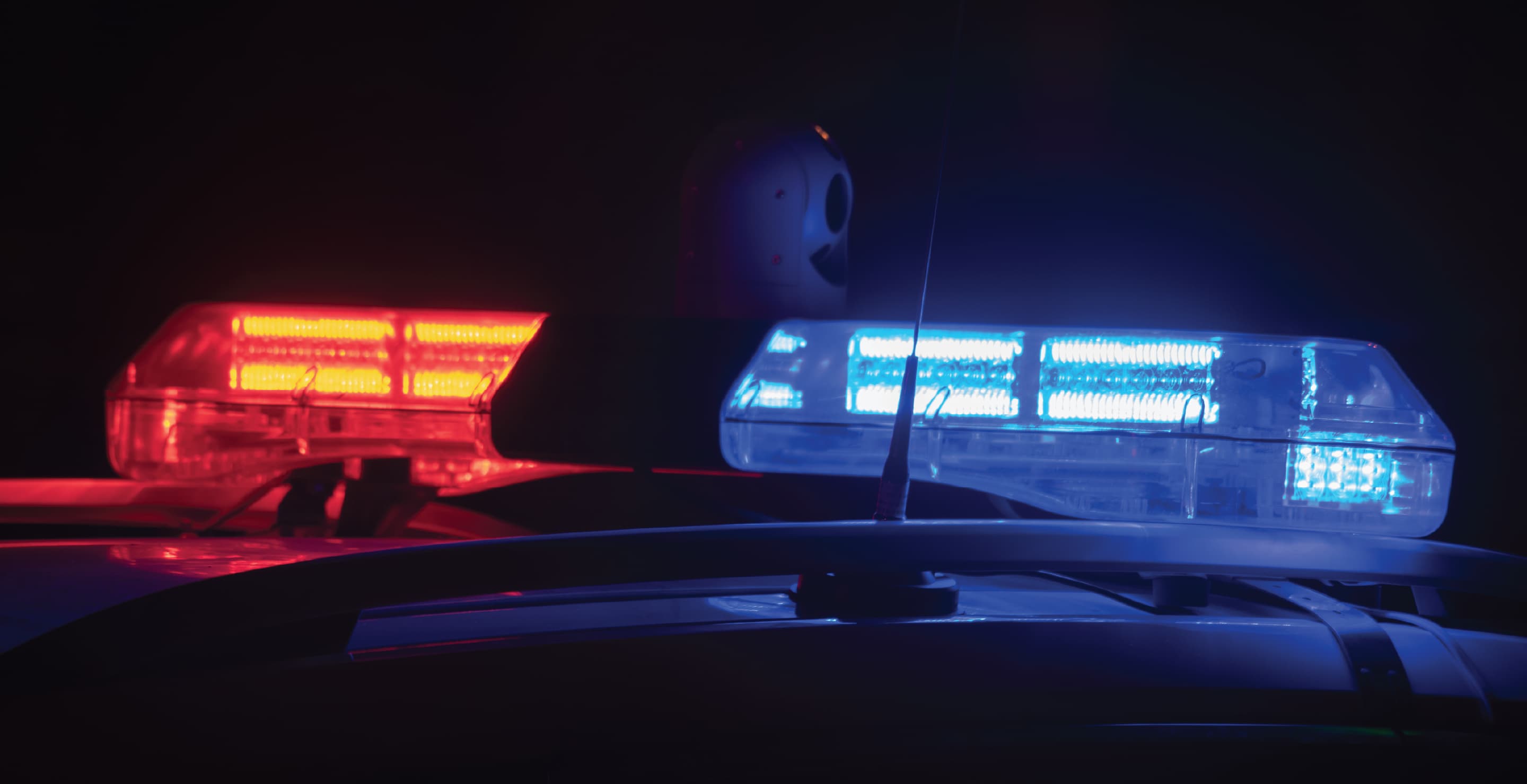Police Car Red And Blue Lights At Night