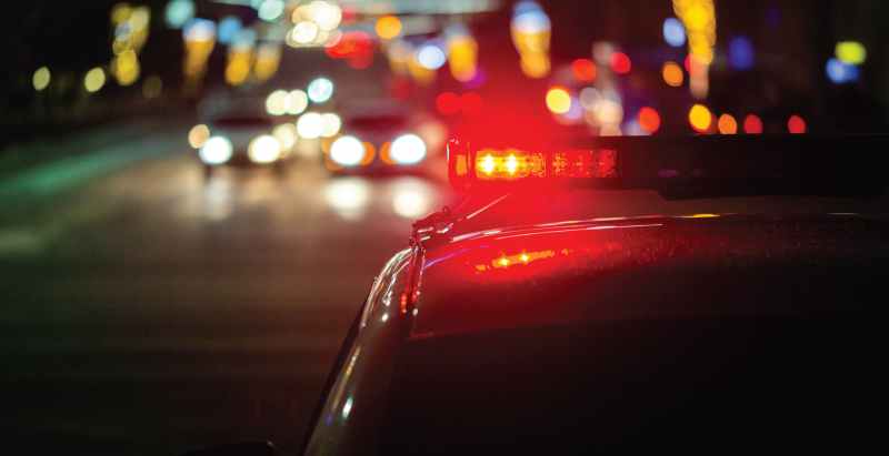 Police Car Red Light At Night