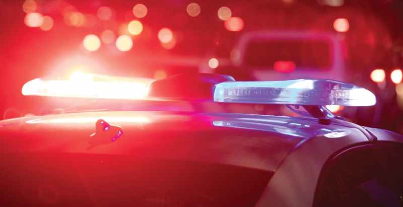 Police Patrol Car Flashing Red And Blue Lights