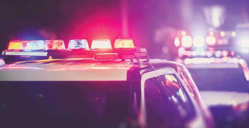 Police Patrol Cars Flashing Red And Blue Lights