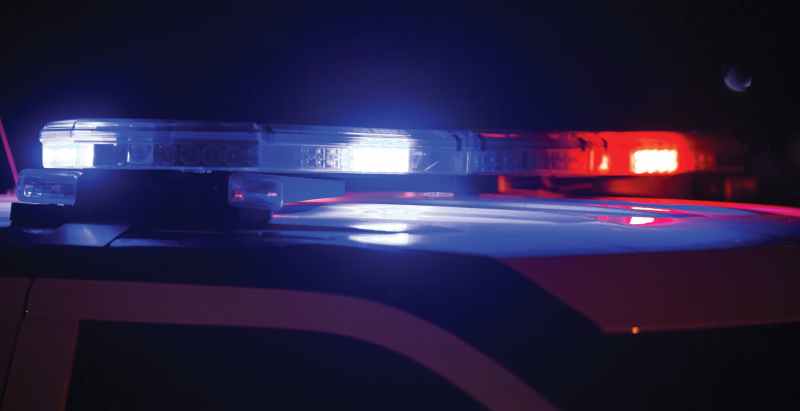 Police Unit Stops At Crime Scene, Flashes Lights