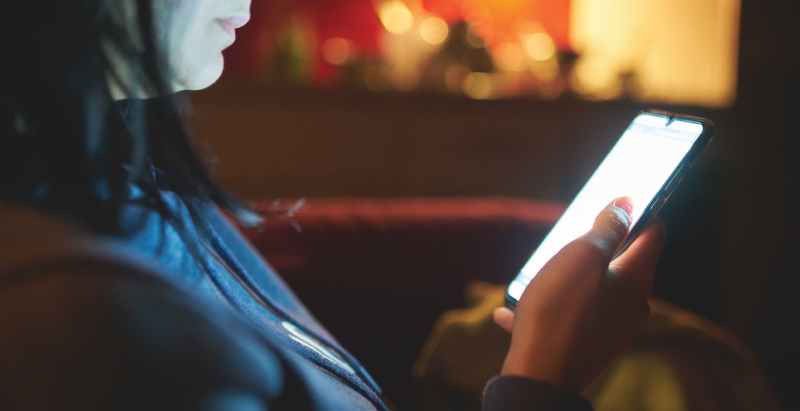 Woman Texting At Night