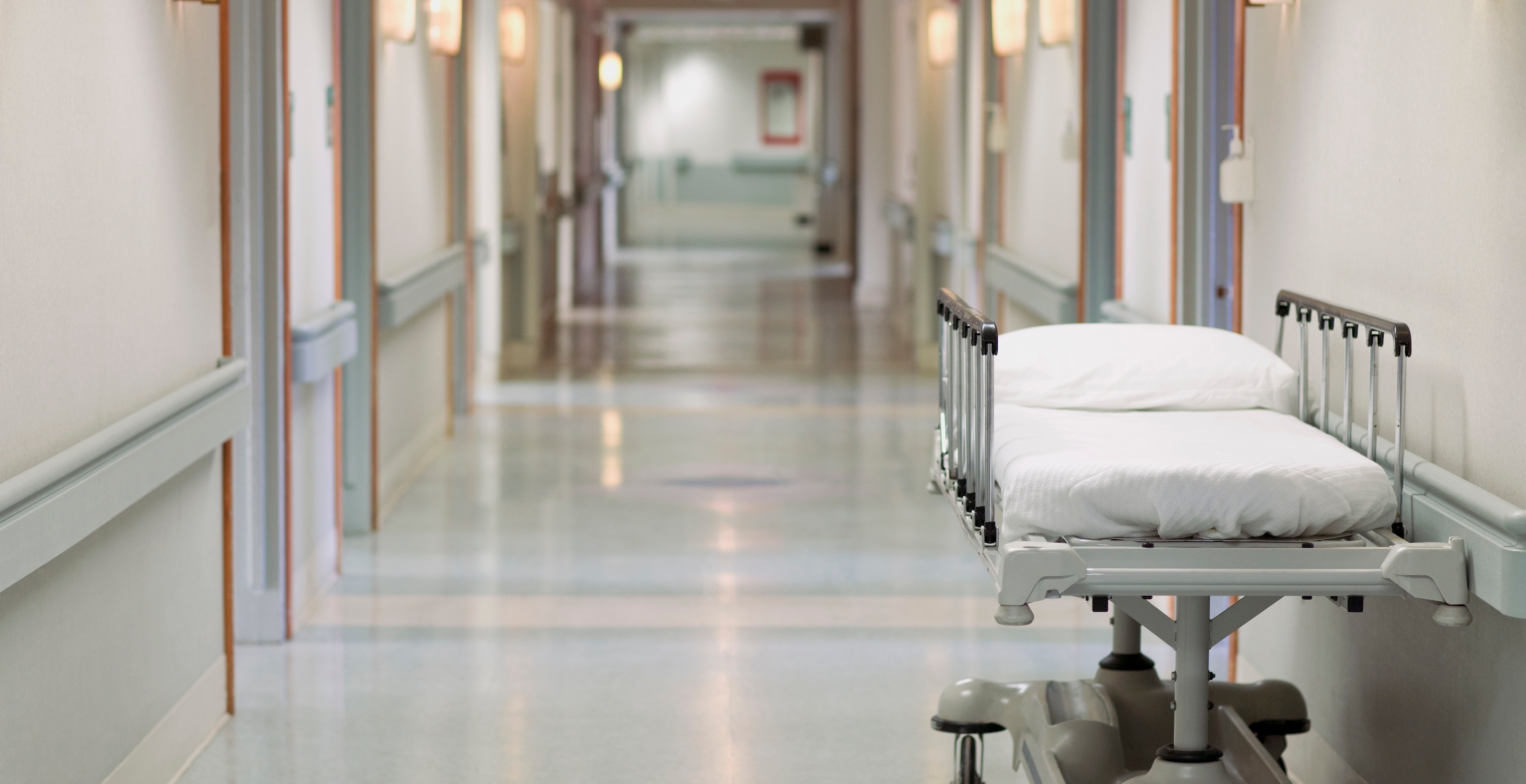 Terrifying Video Shows Gunman Chasing Woman Through Hospital