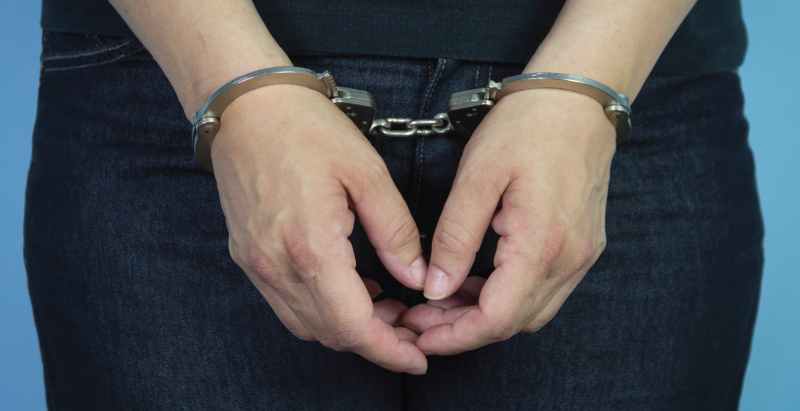 Handcuffed Woman