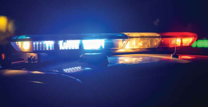 Red, Blue, And White Light Bar On Police Car