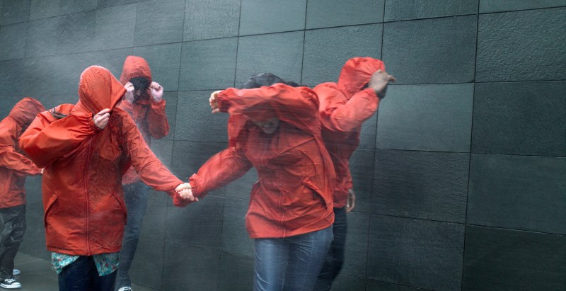 Strong Wind Gusts Blow Woman Into Oncoming Traffic In Terrifying Moment