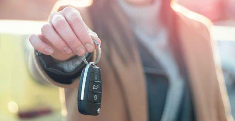 Woman Holding Car Key