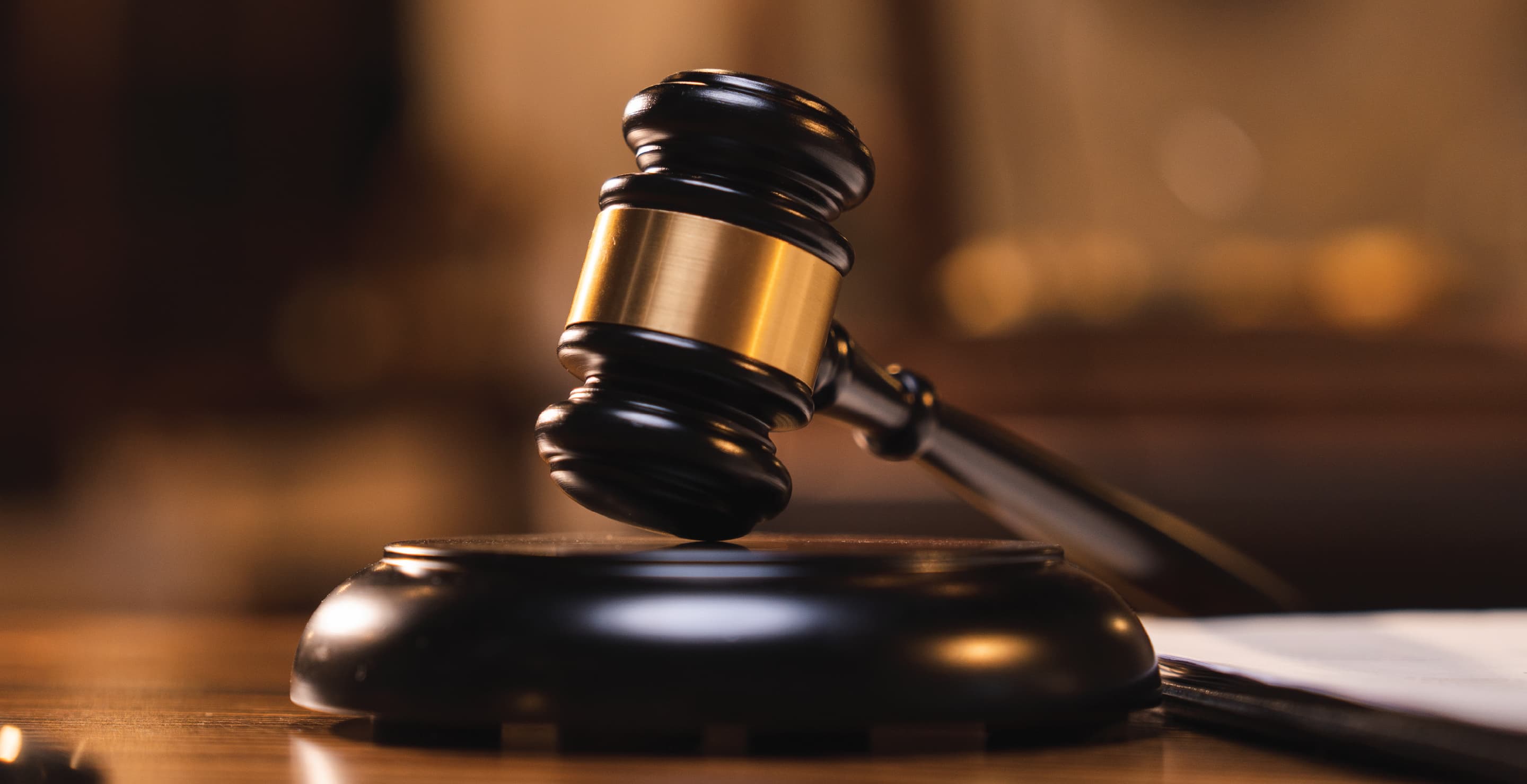 Wooden Judge Gavel On Desk