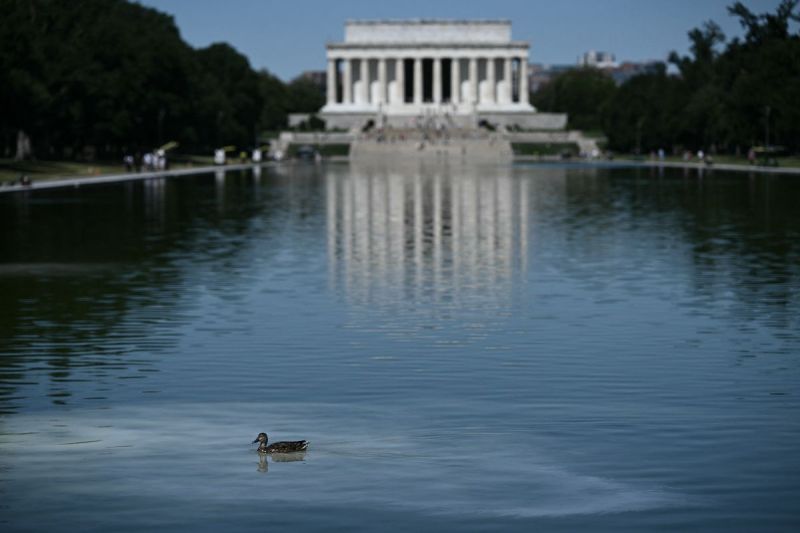 trump-administration-blames-obama-for-why-american-flag-blue-reflecting-pool-is-now-green