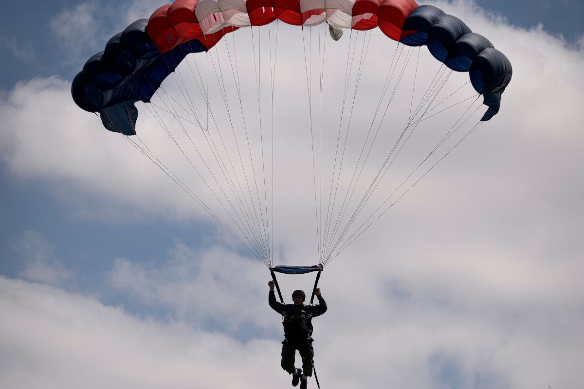 Patriotic Skydiver’s Landing Goes Disastrously Wrong, Crashes Into Rodeo On-Camera