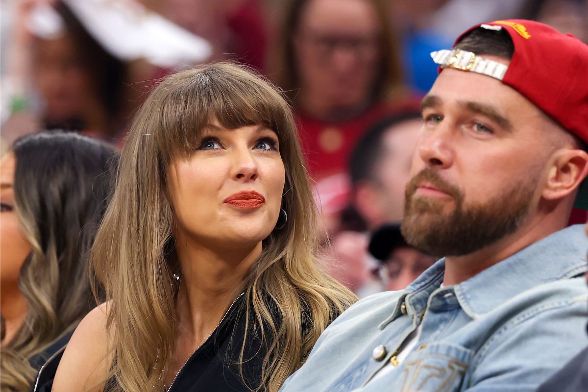 taylor-swift-travis-kelce-guest-white-dress